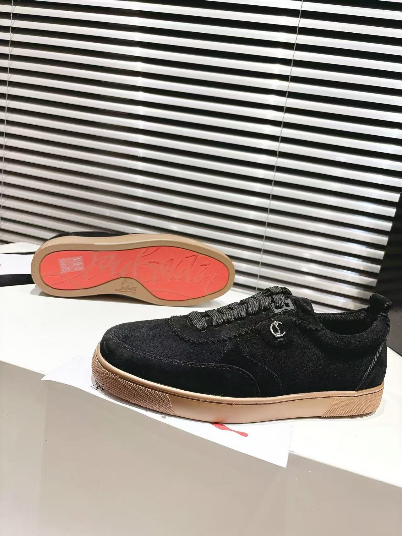 UA Ch**an Louboutin Sneaker