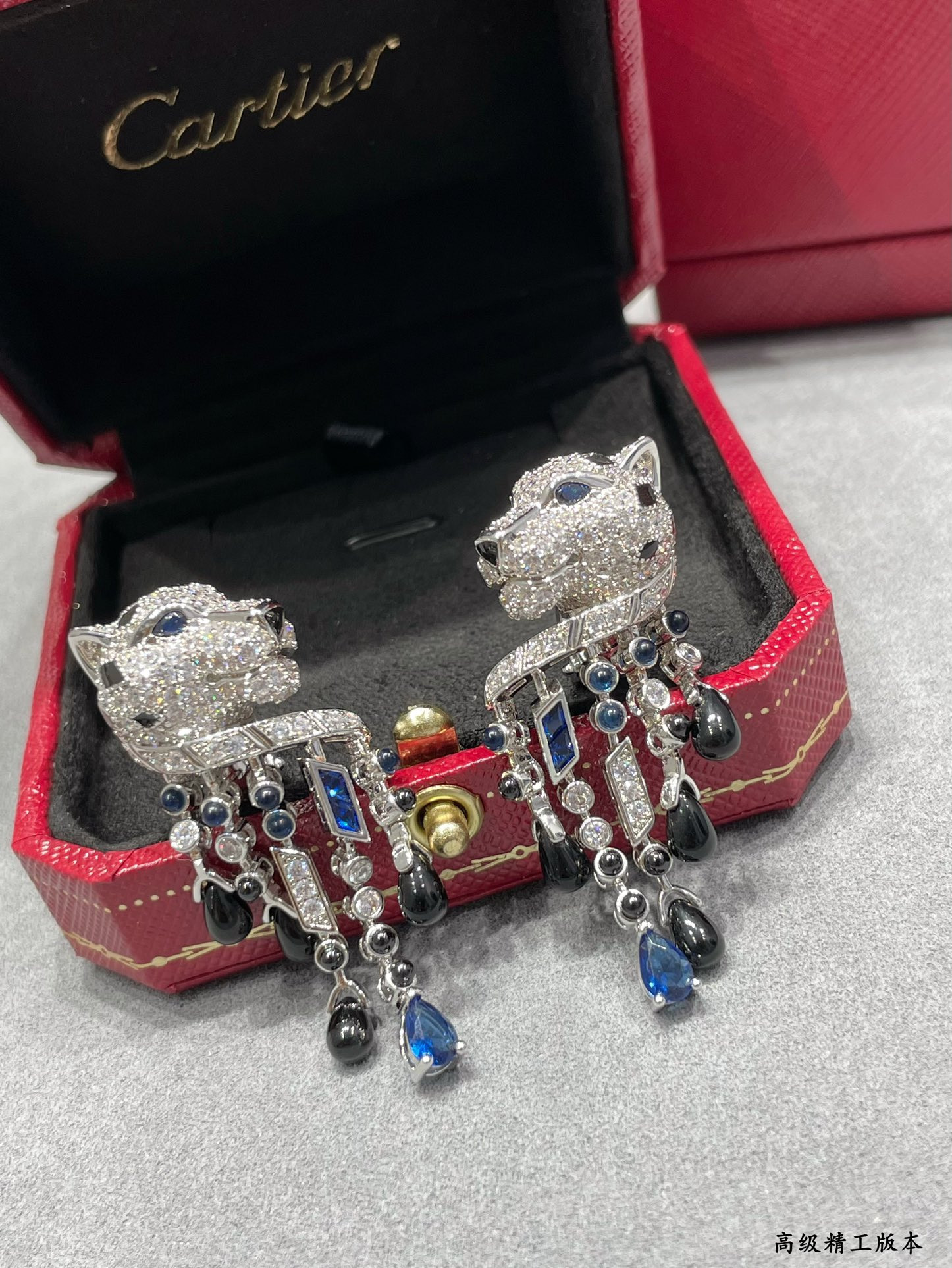Ca*t*er Black Onyx Blue Diamond Leopard Earrings